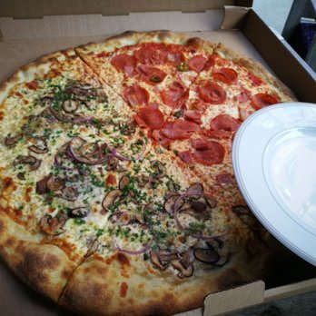 La New-Yorkaise - The 22" (plate for size comparison) - Pizza Near Me - Montreal, Quebec