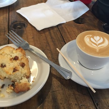 Due South Coffee Roasters - Chocolate cinnamon scone and cappucino - Coffee & Tea Near Me - Greenville, South Carolina Due South Coffee Roasters - Chocolate cinnamon scone and cappucino - Coffee & Tea Near Me - Greenville, South Carolina