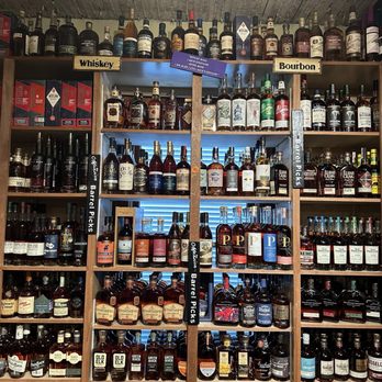 The Mansion - One wall in the Spirits room - New American Near Me - Melbourne, Florida