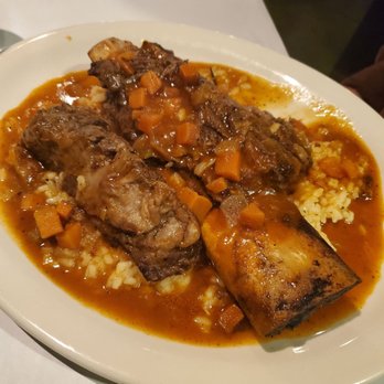 Bosfa Italian Restaurant - Slow cooked short ribs over risotto - Italian Near Me - Old Tappan, New Jersey Bosfa Italian Restaurant - Slow cooked short ribs over risotto - Italian Near Me - Old Tappan, New Jersey