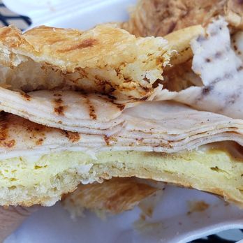 The Grind - Breakfast Croissant Sandwich with turkey, egg, and mozzarella cheese - Coffee & Tea Near Me - Apple Valley, California The Grind - Breakfast Croissant Sandwich with turkey, egg, and mozzarella cheese - Coffee & Tea Near Me - Apple Valley, California