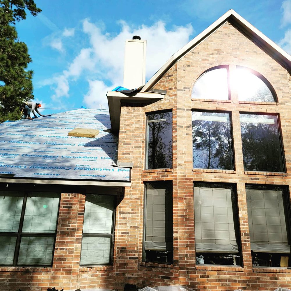 Slide of Hauk Roofing