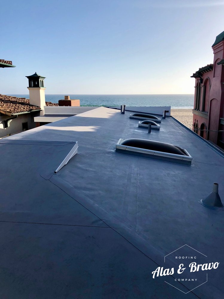 Slide of Alas & Bravo Roofing Company