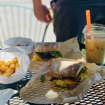 River Maiden - a sandwich and french fries on a table - Coffee & Tea Near Me - Vancouver, Washington River Maiden - a sandwich and french fries on a table - Coffee & Tea Near Me - Vancouver, Washington