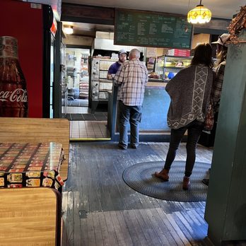 Countrypie Pizza - Menu is over the counter. People are waiting to pick up take out orders. - Pizza Near Me - Ashfield, Massachusetts Countrypie Pizza - Menu is over the counter. People are waiting to pick up take out orders. - Pizza Near Me - Ashfield, Massachusetts