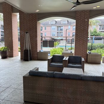 Elate Royal Oaks - The fool in the background the patio we have - Apartments Near Me - Houston, Texas Elate Royal Oaks - The fool in the background the patio we have - Apartments Near Me - Houston, Texas