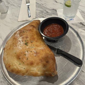 Elf's Den Restaurant & Lounge - Calzone  Create Your Own Calzone Create Your Own Calzone Elf's Special - American Near Me - North Pole, Alaska