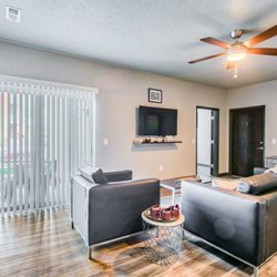 Stadium View Suites Apartments - Living Room
