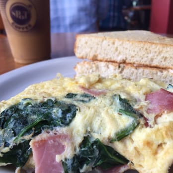 SPoT Coffee - 3-egg spinach, ham, and cheese omelette with focaccia bread - Coffee & Tea Near Me - Buffalo, New York SPoT Coffee - 3-egg spinach, ham, and cheese omelette with focaccia bread - Coffee & Tea Near Me - Buffalo, New York