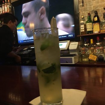Mojito Cafe & Lounge - a man in the background - Latin American Near Me - Port Washington, New York Mojito Cafe & Lounge - a man in the background - Latin American Near Me - Port Washington, New York