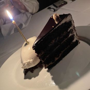 Maple & Ash - The Chocolate Cake with vanilla ice cream - Steakhouses Near Me - Chicago, Illinois Maple & Ash - The Chocolate Cake with vanilla ice cream - Steakhouses Near Me - Chicago, Illinois
