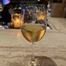 Glass of wine at the bar