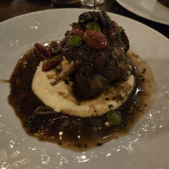 CUT by Wolfgang Puck - Pork shank with polenta - Steakhouses Near Me - Las Vegas, Nevada CUT by Wolfgang Puck - Pork shank with polenta - Steakhouses Near Me - Las Vegas, Nevada