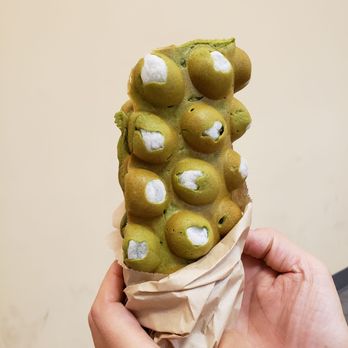 Cafe Eggstatic - a person holding an ice cream cone - Bubble Tea Near Me - Burnaby, British Columbia Cafe Eggstatic - a person holding an ice cream cone - Bubble Tea Near Me - Burnaby, British Columbia