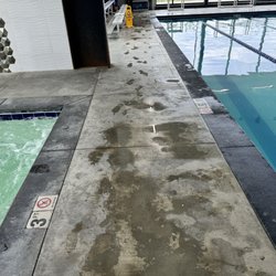 Genesis Health Clubs - The color spectrum of the hot tub and pool. It has been like this for more than a week.