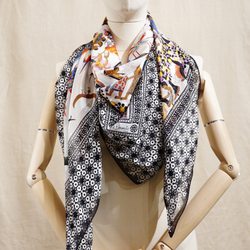 Our theme L'Afrique c'est chic.                 This silk shawl is a weave of chiffon and satin and screen printed