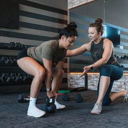Ioana Astilean Fitness - Personal training client learning kettle bell swings!