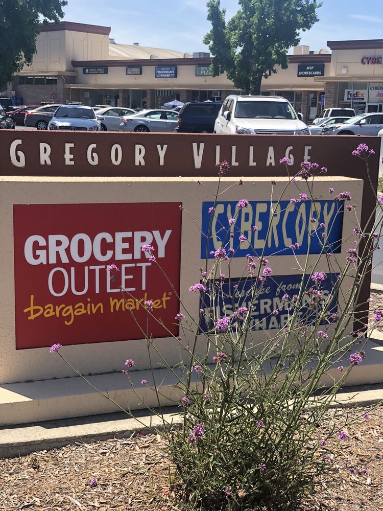 Gregory Village Shopping Center Logo