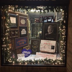 Gill's Custom Framing & Photolab - Christmas Window highlighting Henry Ware Lawton.