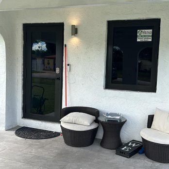 Venus Windows and Doors - Front door and casement window retrofit for residential home. Bronze frame. - Windows Installation Near Me - Miami, Florida Venus Windows and Doors - Front door and casement window retrofit for residential home. Bronze frame. - Windows Installation Near Me - Miami, Florida