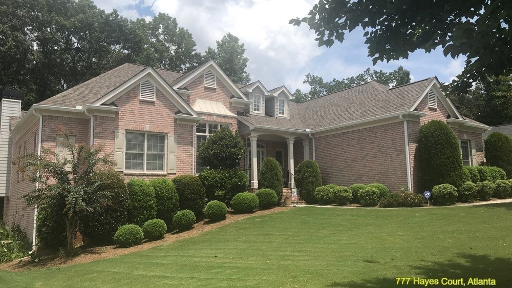 Slide of Stone Mountain Roofing