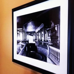 They have a lot of picture on the wall. They have a lot of picture on the wall.