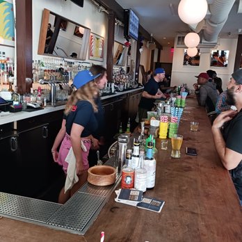 The Brig - a group of people sitting at a bar - Music Venues Near Me - Venice, California