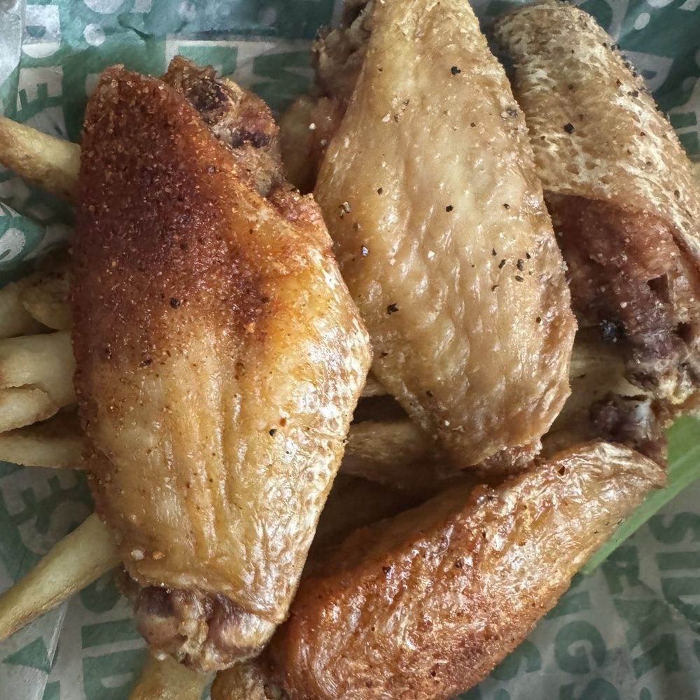 Wingstop - Look at the hot honey on the left - Chicken Wings Near Me - Las Vegas, Nevada Wingstop - Look at the hot honey on the left - Chicken Wings Near Me - Las Vegas, Nevada