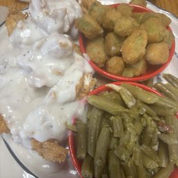 Chicken fried chicken (I didn't expect them to put gravy on top of it tho) you get 2 sides: I chose green beans and fried okra Chicken fried chicken (I didn't expect them to put gravy on top of it tho) you get 2 sides: I chose green beans and fried okra