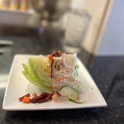 Crumbs - Wedge salad served as an option with your entree - blue cheese dressing was delicious.