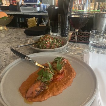 Hamsa - Octopus and Israeli salad and Cabernet Sauvignon from Israel - Mediterranean Near Me - Houston, Texas Hamsa - Octopus and Israeli salad and Cabernet Sauvignon from Israel - Mediterranean Near Me - Houston, Texas