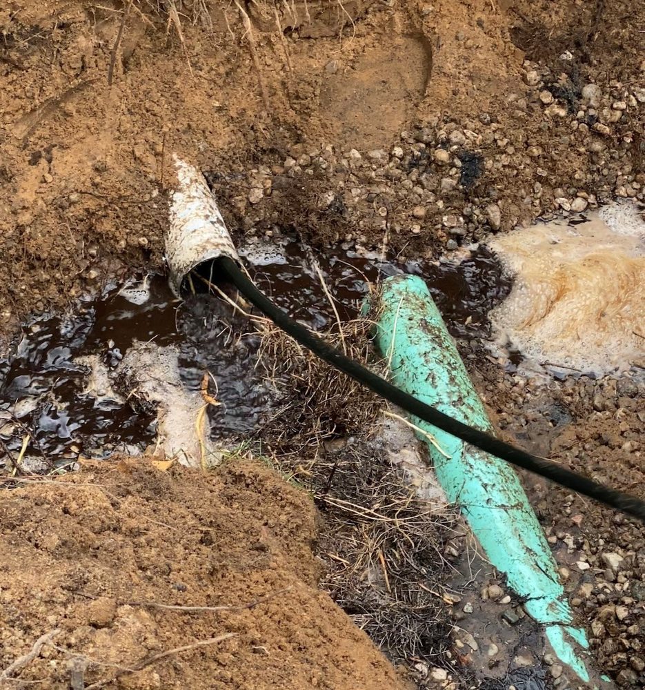 Slide of West Michigan Drain Solutions