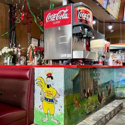El Rey Del Pollo Asado - Where you order and the fountain.