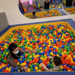 Caden's Lighthouse - Me and my grandson in the ball pit.   It's enormous and a lot of fun!