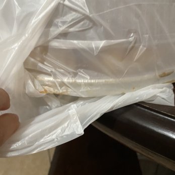 Torres Fresh Market - a person holding a sandwich wrapped in plastic - Grocery Near Me - Berwyn, Illinois Torres Fresh Market - a person holding a sandwich wrapped in plastic - Grocery Near Me - Berwyn, Illinois