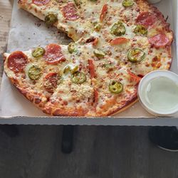 Mama's Pizza - Medium 12 inch pepperoni and jalapenos pizza. As someone else stated, the crust is really good.