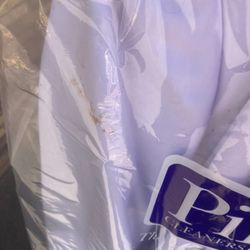 Pilgrim Dry Cleaners - Stain on left hand side of suit.