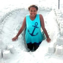 A Shore Thing Beach Service - Cheyenne reminding us to cover your holes before you go!