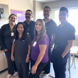 Renown Physical Therapy & Rehabilitation - Double R - The Renown Physiatry team pose for a group photo in the break room.