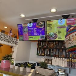Tamales y Tacos Mi Chula - Menu board