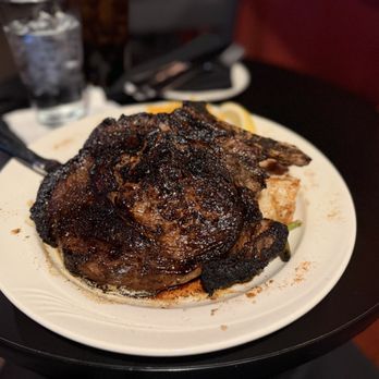 Sonny Williams' Steak Room - Bone in Ribeye green beans and au gratin potatoes - Steakhouses Near Me - Little Rock, Arkansas Sonny Williams' Steak Room - Bone in Ribeye green beans and au gratin potatoes - Steakhouses Near Me - Little Rock, Arkansas