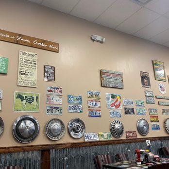 Country Kitchen - a wall full of plates and signs - American Near Me - Tallahassee, Florida