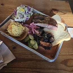 1/2 lb each of the smoked ribs and pork belly with corn casserole and lemon poppy slaw 1/2 lb each of the smoked ribs and pork belly with corn casserole and lemon poppy slaw