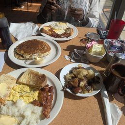 2 breakfast specials w potato and pancake sides