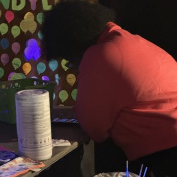 Partees 3d Glowgolf Norfolk - Employee on her phone texting rather than paying attention - Mini Golf Near Me - Norfolk, Virginia Partees 3d Glowgolf Norfolk - Employee on her phone texting rather than paying attention - Mini Golf Near Me - Norfolk, Virginia
