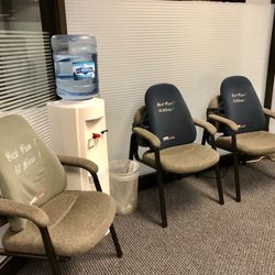 Michael G Luban DC - A part of their waiting room, have to love the chairs that say "Back pain? Sit here!" haha!