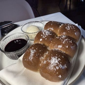 G Prime - Delicious rolls with spread and Blueberry compote - Steakhouses Near Me - Wilmington, North Carolina G Prime - Delicious rolls with spread and Blueberry compote - Steakhouses Near Me - Wilmington, North Carolina