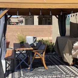 Assembled 10x10 gazebo with outdoor lights installed.