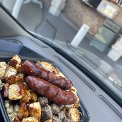 El Gordo Hotdog - Rice and noodles at the bottom with chicken, beef, and shrimp.. added 2 hotlinks for an additional charge