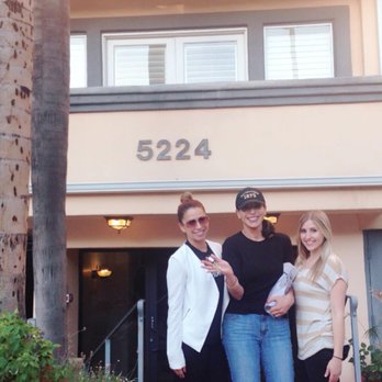 Nelson Osgood Team - Media West Realty - First time homebuyer receiving the keys to her new home in Encino. That smile is why we love doing what we do! - Real Estate Agents Near Me - Burbank, California Nelson Osgood Team - Media West Realty - First time homebuyer receiving the keys to her new home in Encino. That smile is why we love doing what we do! - Real Estate Agents Near Me - Burbank, California